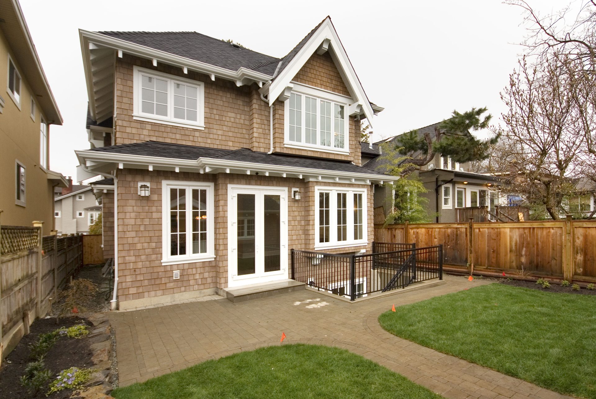 Rear of the main residence with patio and yard