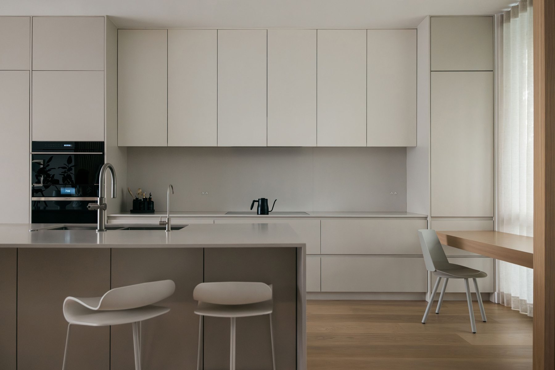 Minimalist kitchen with integrated appliances