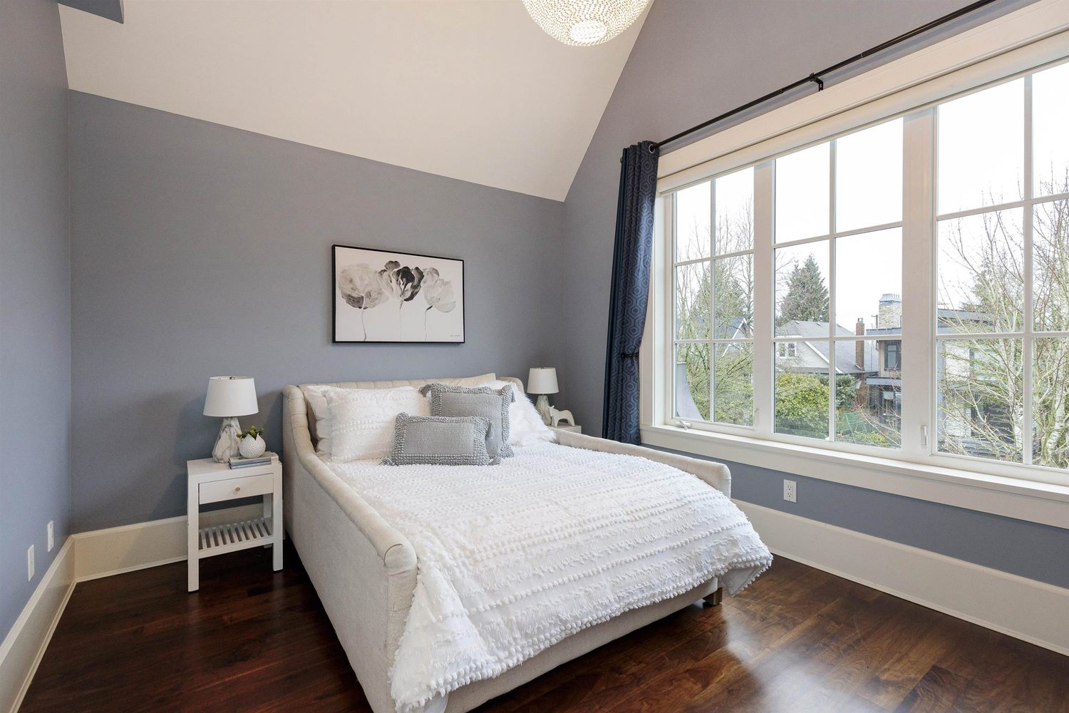 Bedroom with vaulted ceiling