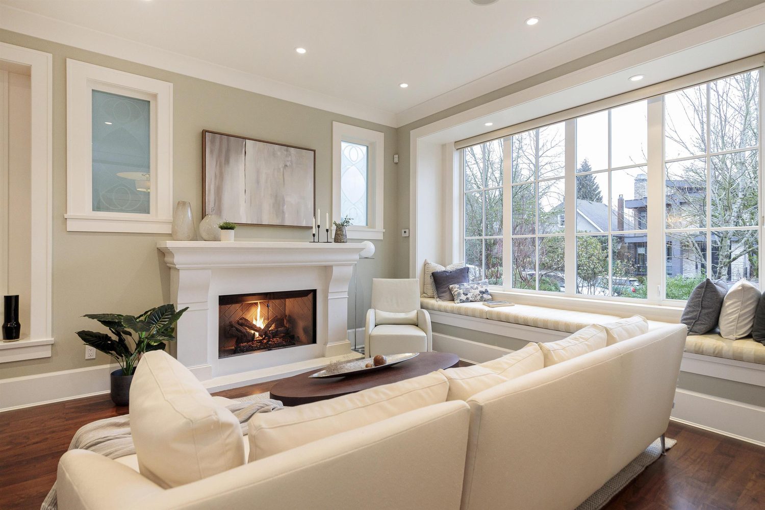 Living room with fireplace and window seat